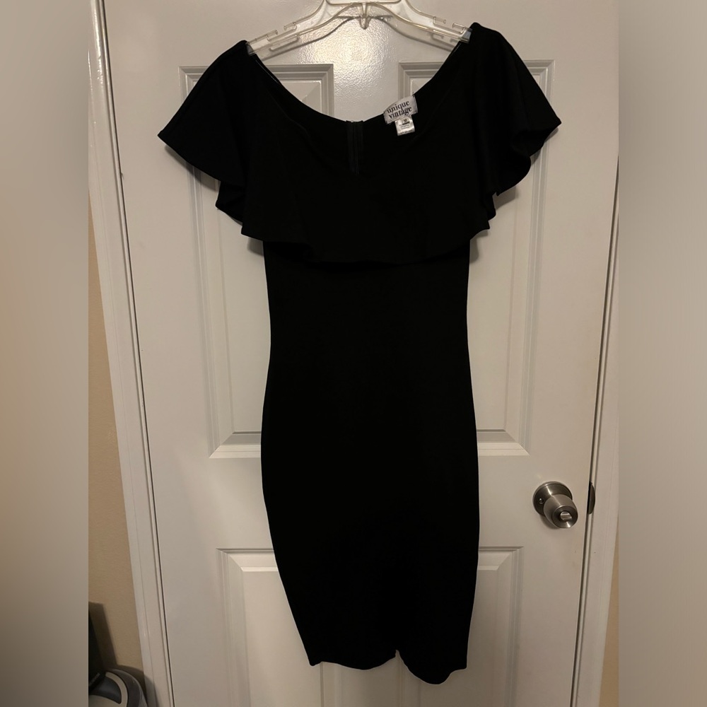 Unique vintage off the shoulder wiggle dress.